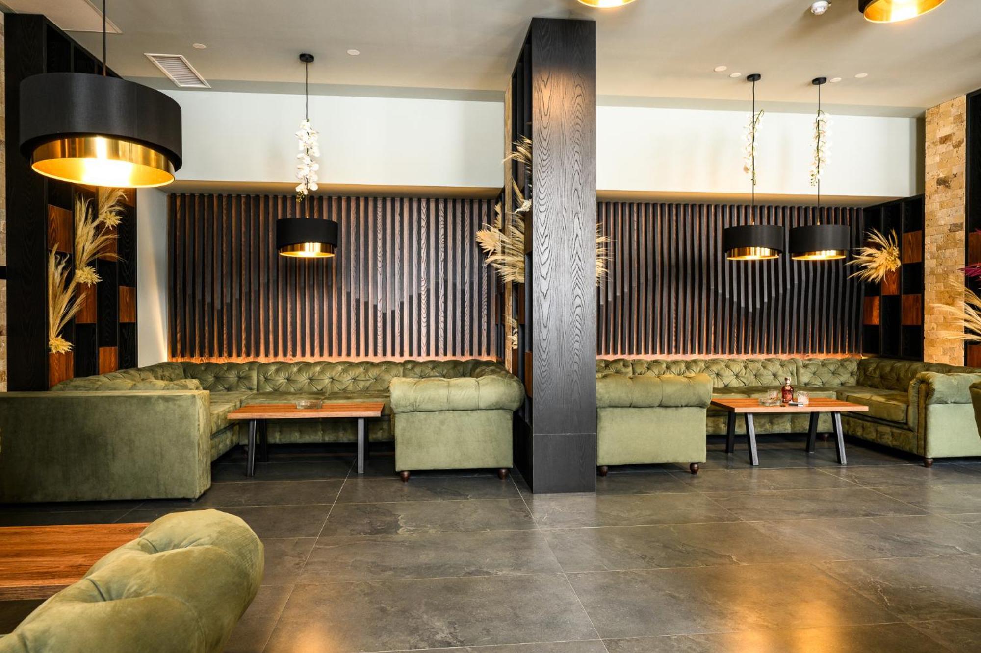 Grand Hotel เวลินกราด ภายนอก รูปภาพ Interior of the restaurant
