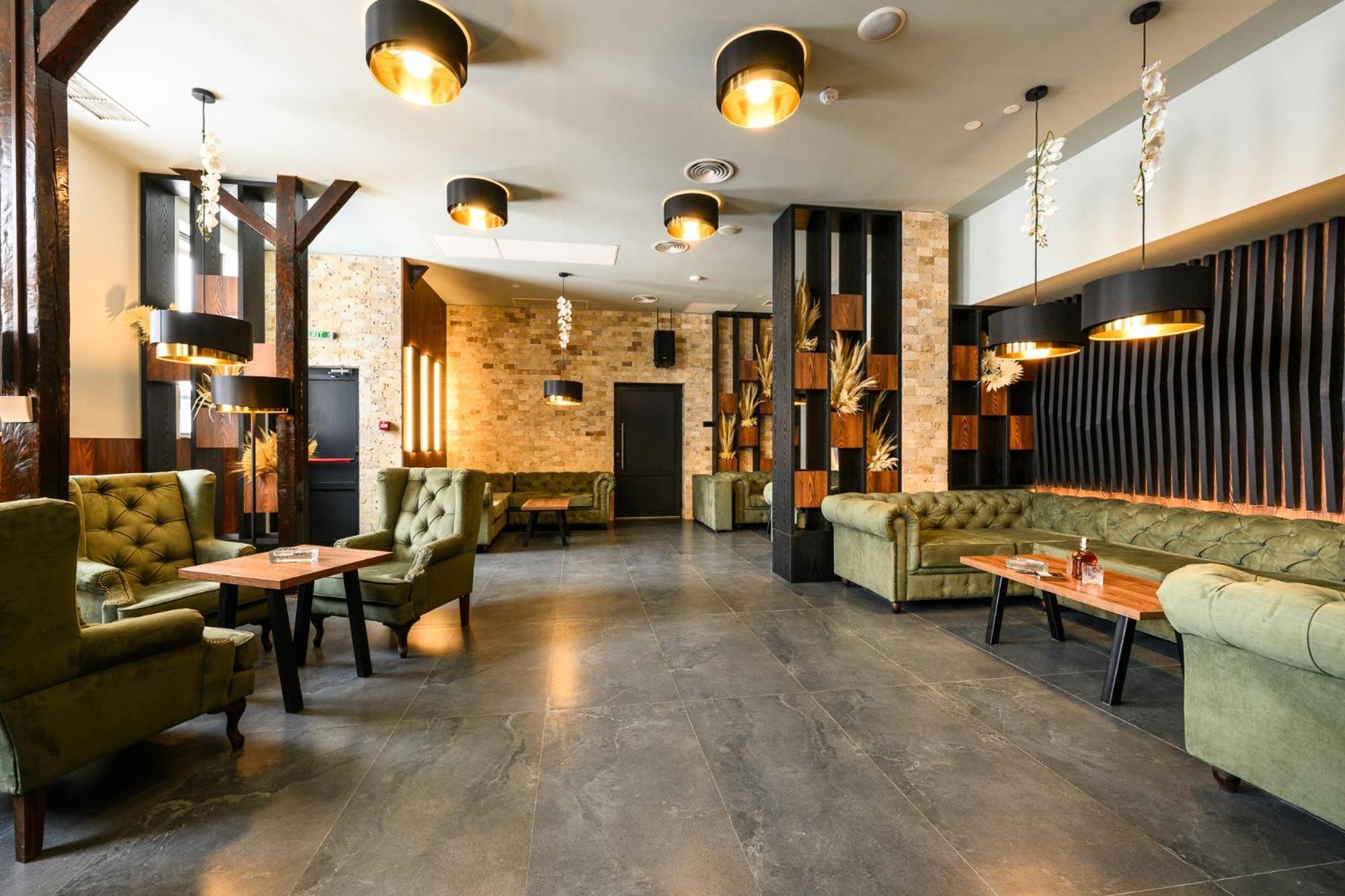Grand Hotel เวลินกราด ภายนอก รูปภาพ Interior of a restaurant