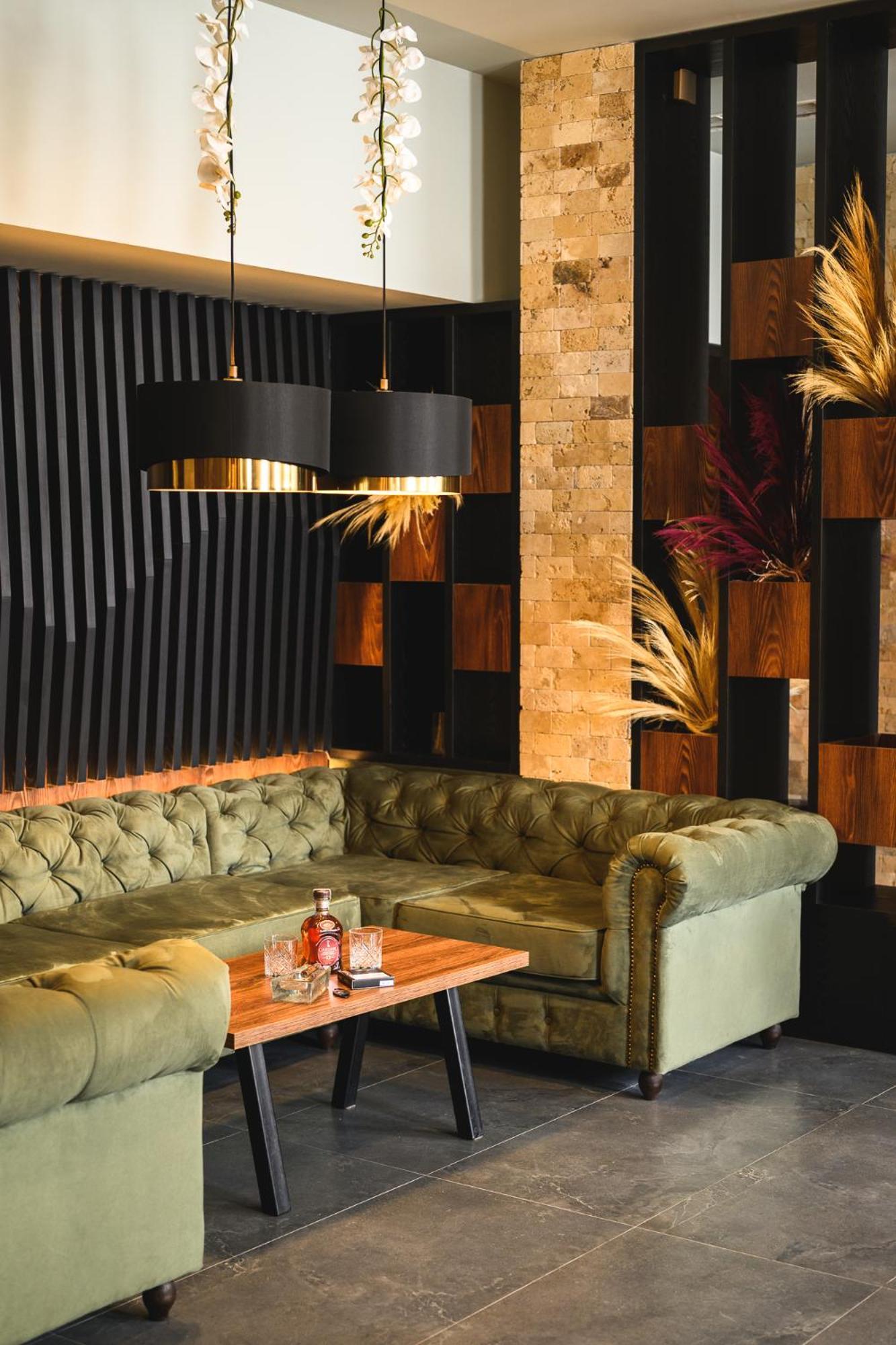Grand Hotel เวลินกราด ภายนอก รูปภาพ Interior of the restaurant