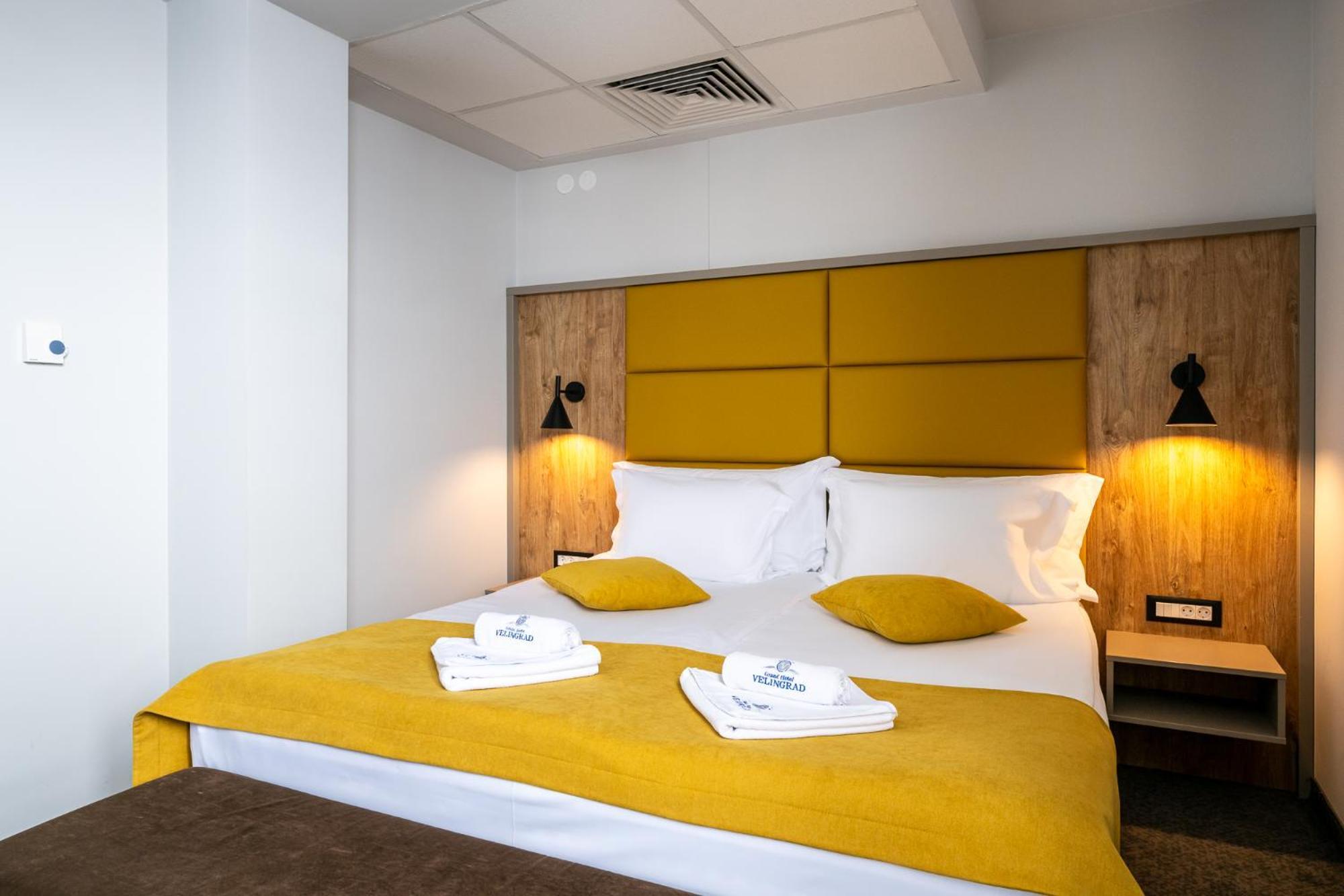 Grand Hotel เวลินกราด ภายนอก รูปภาพ A room at the hotel