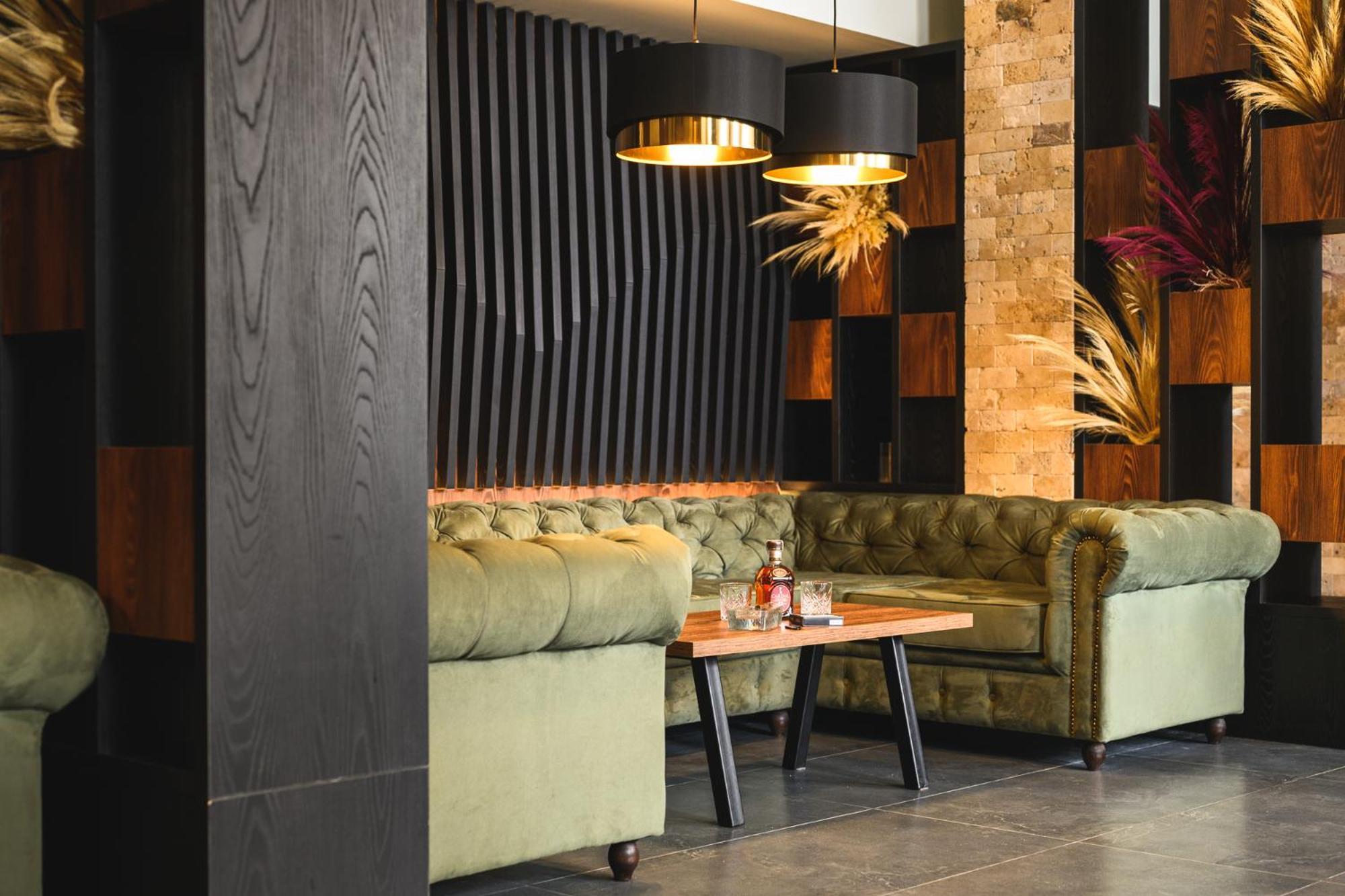 Grand Hotel เวลินกราด ภายนอก รูปภาพ Interior of the restaurant